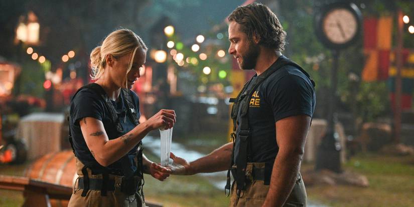 Leven Rambin bandaging Max Thieriot's hand.