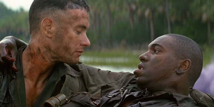 Forrest Gump (Tom Hanks) holds a dying Bubba (Mykelti Williamson) in Vietnam in 'Forrest Gump'
