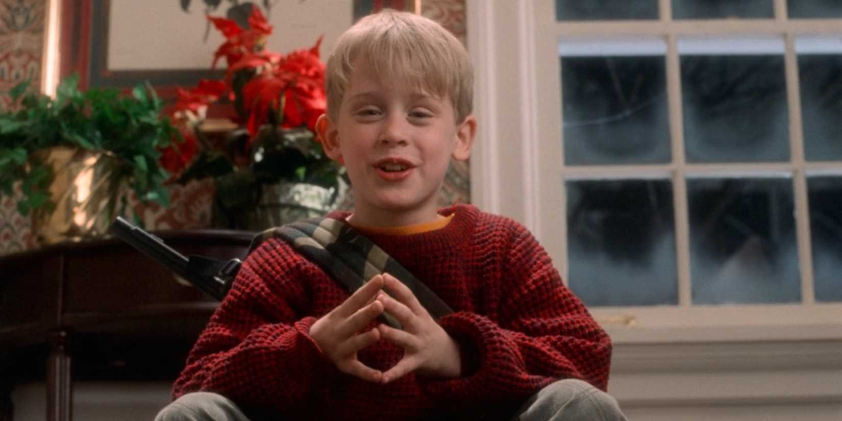 Kevin McCallister, played by Macaulay Culkin, presses his fingertips together in 'Home Alone'.