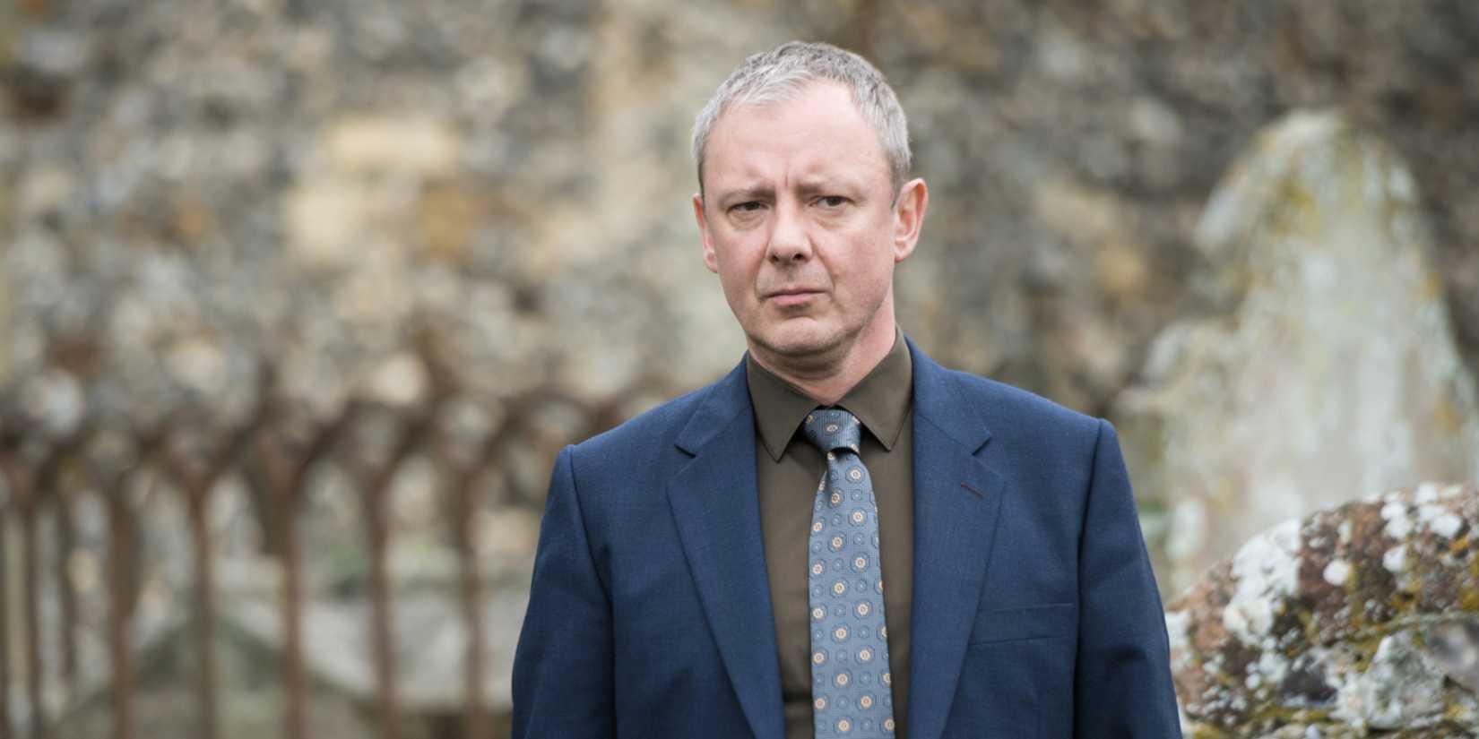 John Simm as Detective Superintendent Roy Grace looking concerned in 'Grace' 