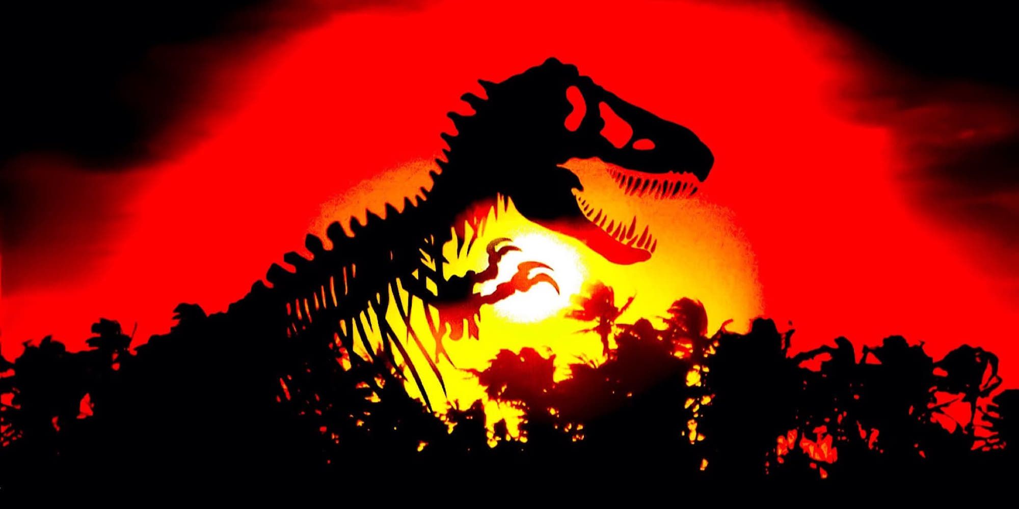A silhouette of a T-Rex skeleton against a setting sun for Jurassic Park (1993).
