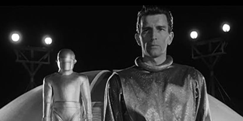Klaatu (Michael Rennie) and Gort (Lock Martin) arrive on Earth in The Day the Earth Stood Still.