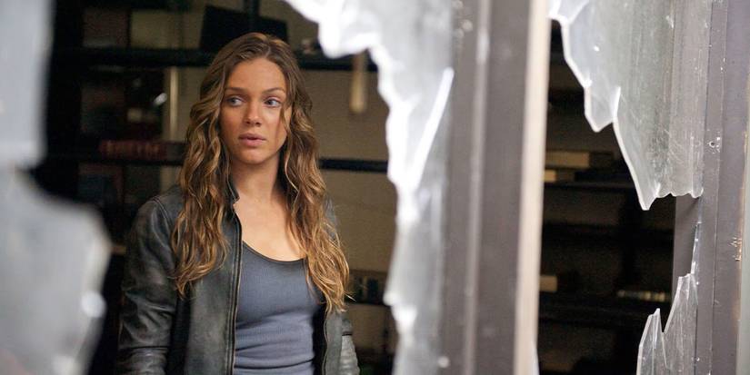 Charlie Matheson (Tracy Spiridakos) looks through broken glass on 'Revolution'