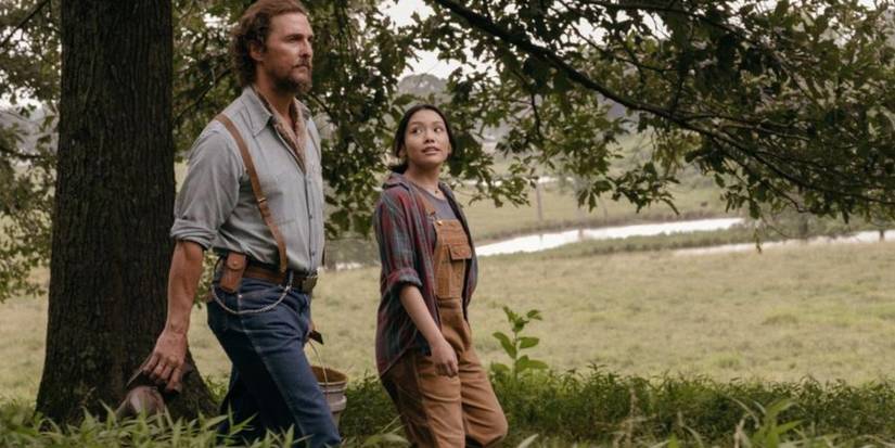 Matthew McConaughey walking with a girl in The Rivals of Amziah