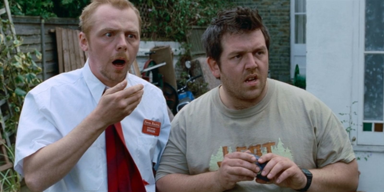 shaun-of-the-dead-simon-pegg-nick-frost-shaun-and-ed-with-camera The Definitive Zombie Movie of the 2000s Officially Finds a New Streaming Home