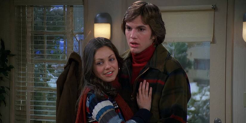 Jackie (Mila Kunis) and Kelso (Ashton Kutcher) hugging in 'That 70s Show'