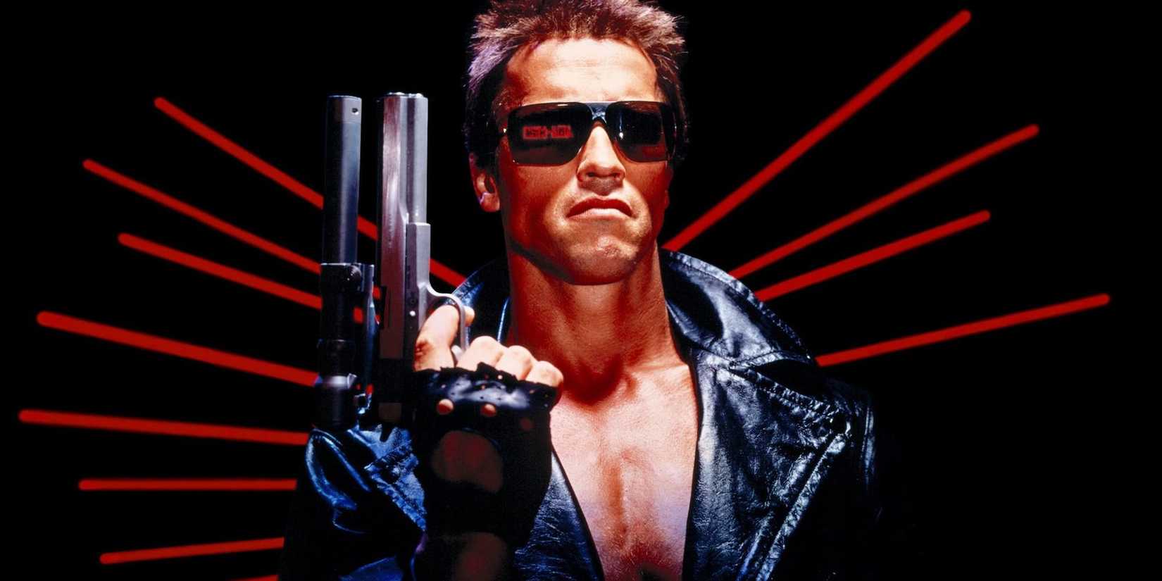 Arnold Schwarzenegger in sunglasses holding a weapon on the poster for The Terminator.