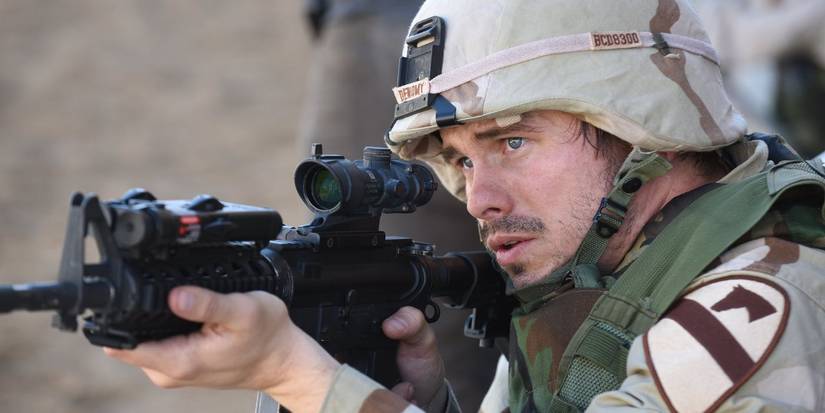 Jason Ritter aims his rifle in 'the long road home'