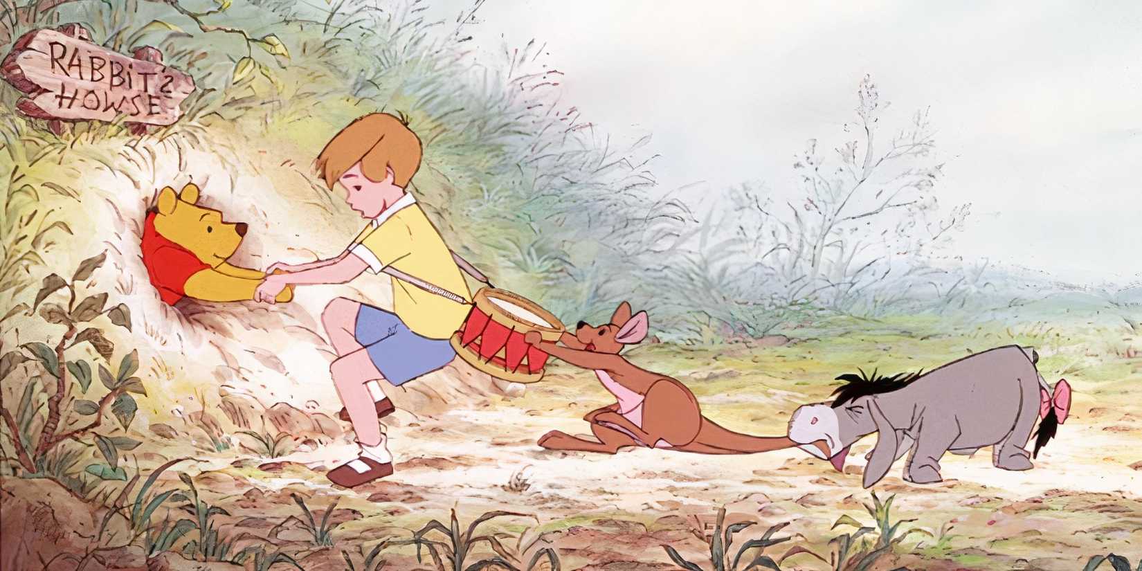 christopher robin, roo and eeyore pulling pooh bear when he is stuck.