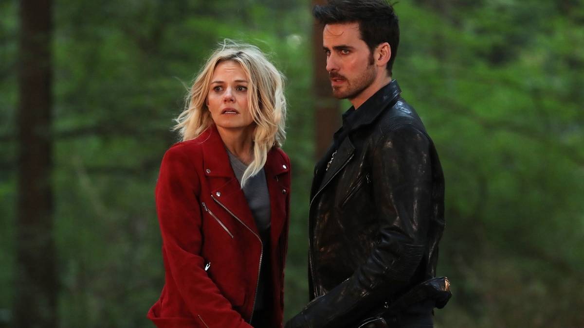 Jennifer Morrison and Colin O'Donohue standing close together outdoors in Once Upon a Time.