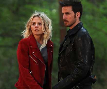 Jennifer Morrison and Colin O'Donohue standing close together outdoors in Once Upon a Time.