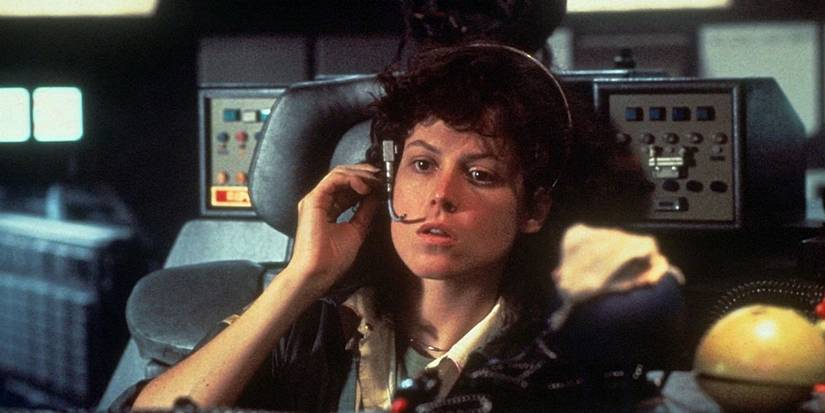 Actor Sigourney Weaver as Ellen Ripley, talking into a microphone headset in Alien