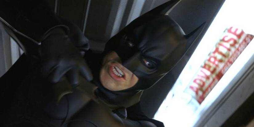 Batman in the middle of a fight in Batman Begins