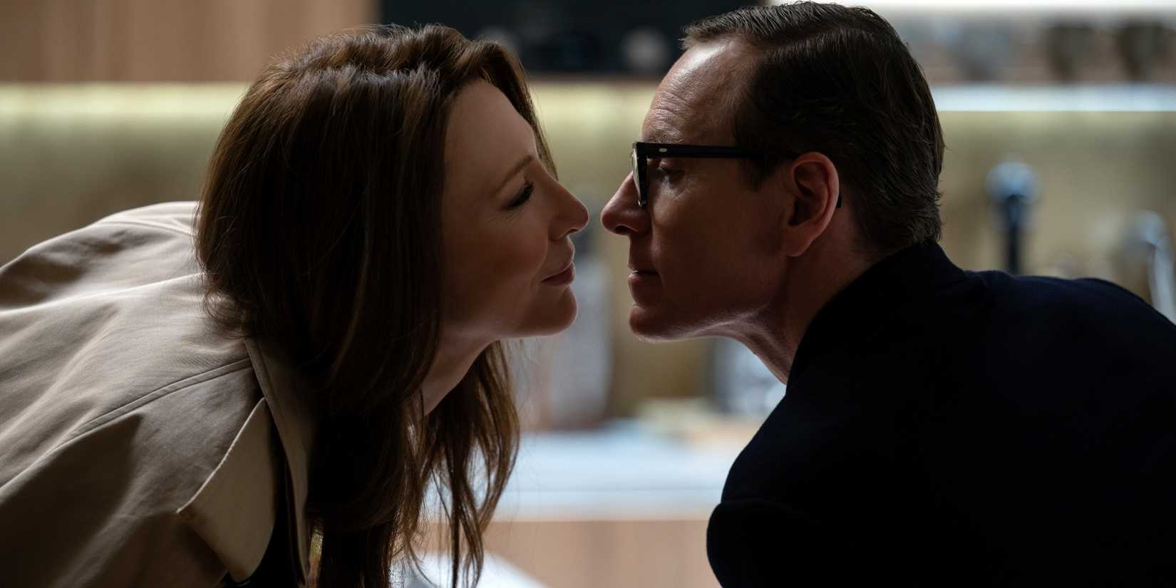 Michael Fassbender as George Woodhouse leaning in to kiss Cate Blanchett as his wife Kathryn in Black Bag.