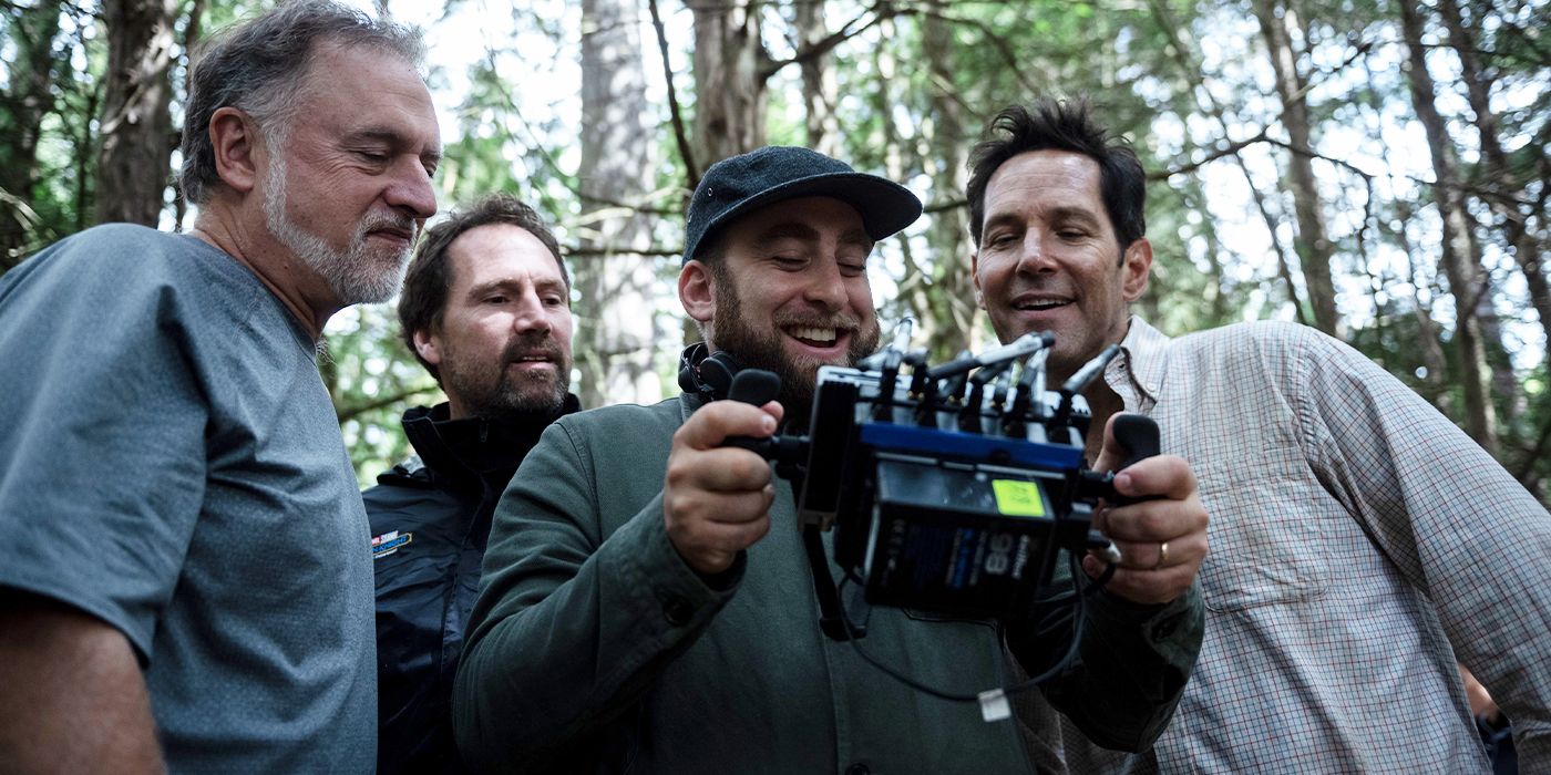 Writer-director Alex Scharfman with crew and Paul Rudd on the set of Death of a Unicorn