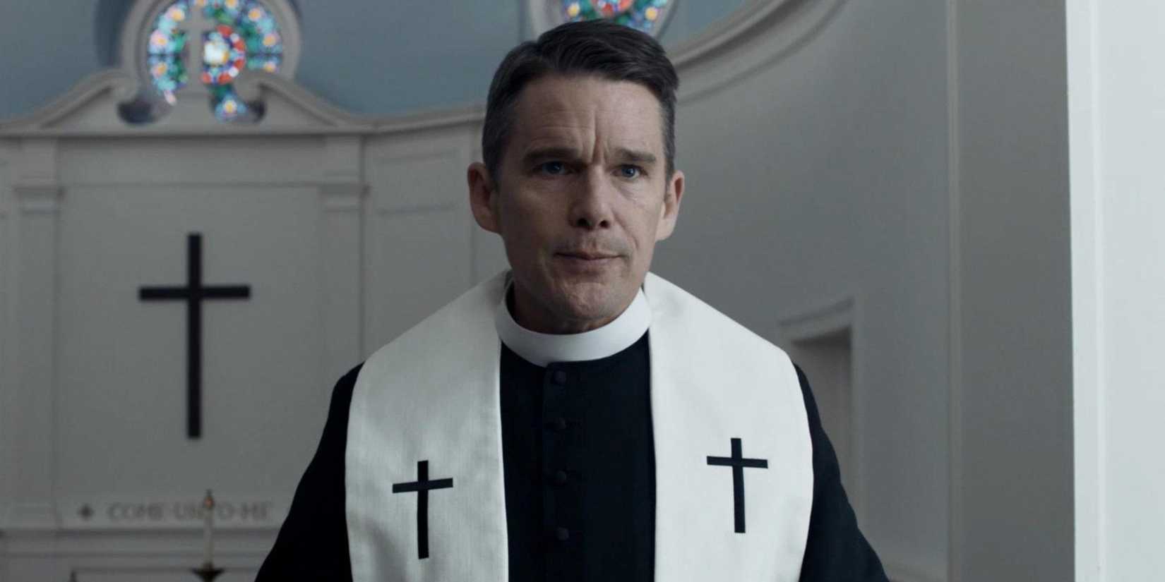 Ethan Hawke as Pastor Toller in church in First Reformed.