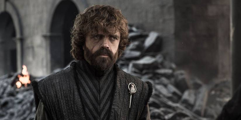 Tyrion Lannister looking upset amid the burnt King's Landing in Game of Thrones