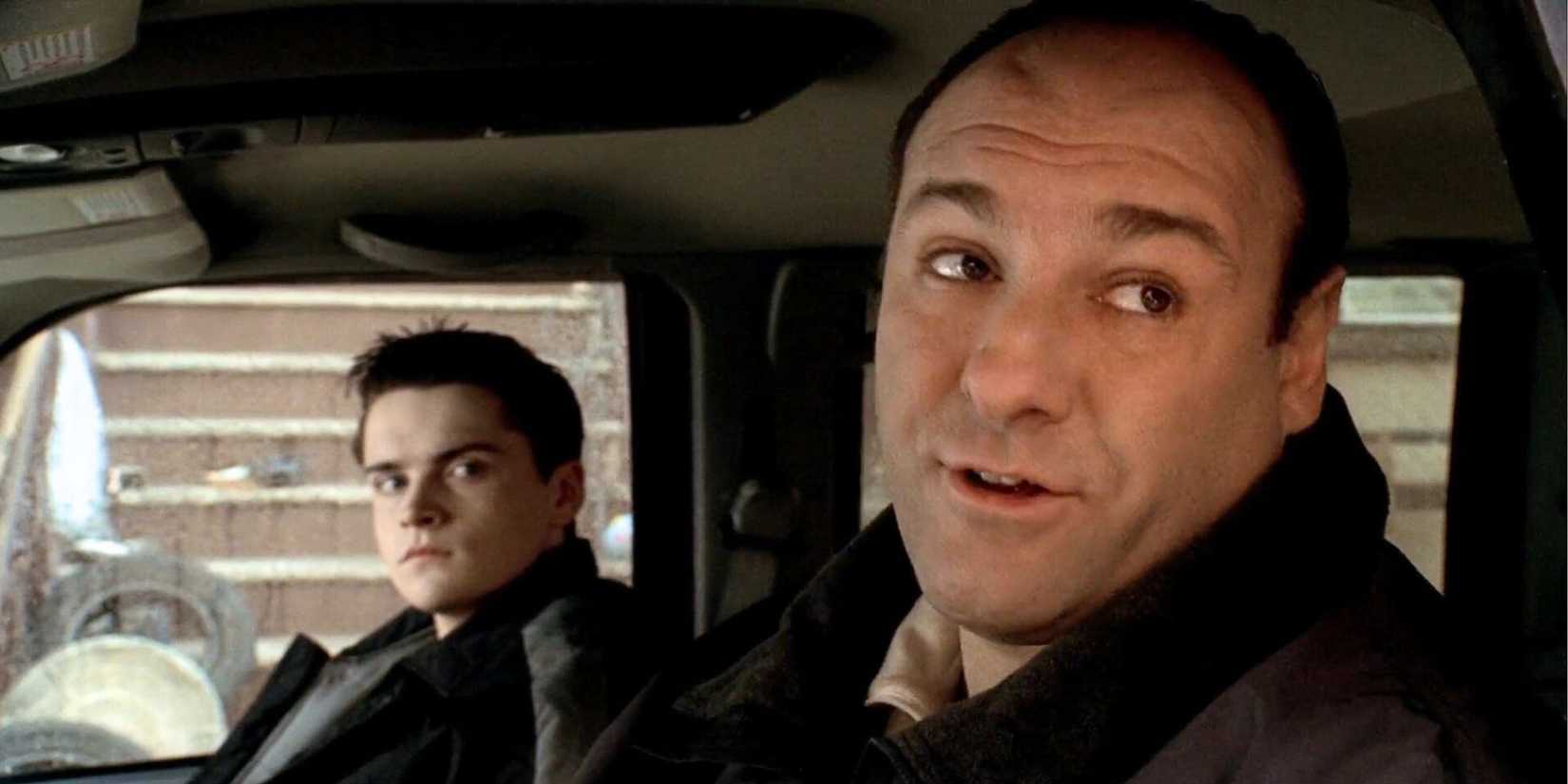 James Gandolfini sitting the driver's seat of a car with Robert Iler sitting in the passenger seat in The Sopranos S4,E7.