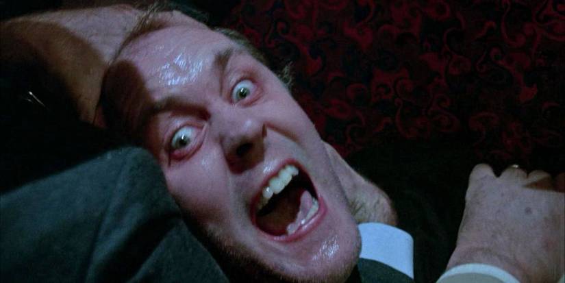 John Valentine, played by John Lithgow, screams in terror in Twilight Zone: The Movie.