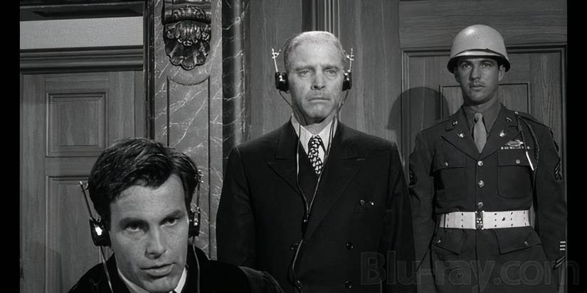 A judge with two men behind him in Judgment at Nuremberg