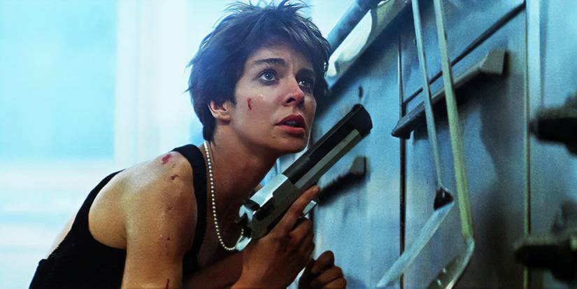 Anne Parillaud holding a gun in La Femma Nikita