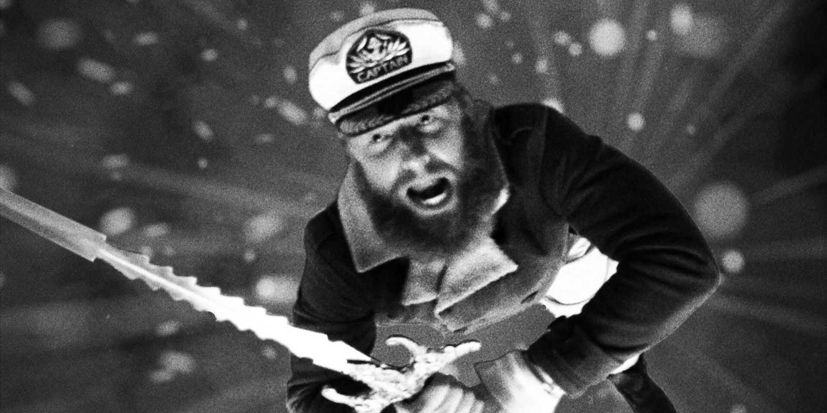 Ryland Brickson Cole Tews as Captain Seafield charging with a two handed sword in 'Lake Michigan Monster'