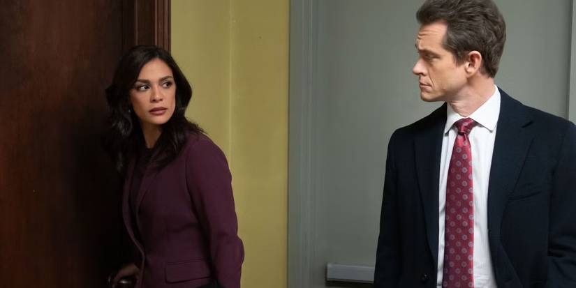 Odelya Halevi as Sam Maroun and Hugh Dancy as Nolan Price side eye each other in Law & Order.