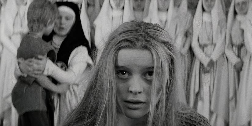 A young woman with a group of nuns behind her in Marketa Lazarova