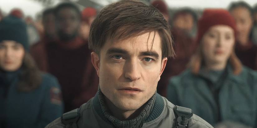 Robert Pattinson in front of a crowd in Mickey 17
