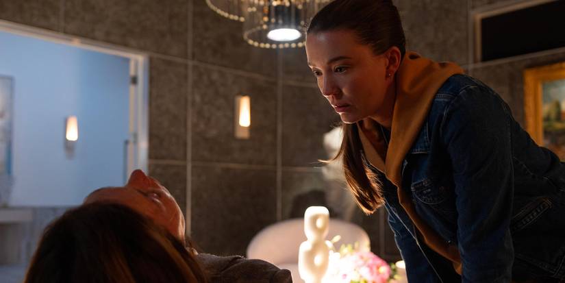 Nicole Brydon Bloom leaning over Julianne Nicholson in Paradise.