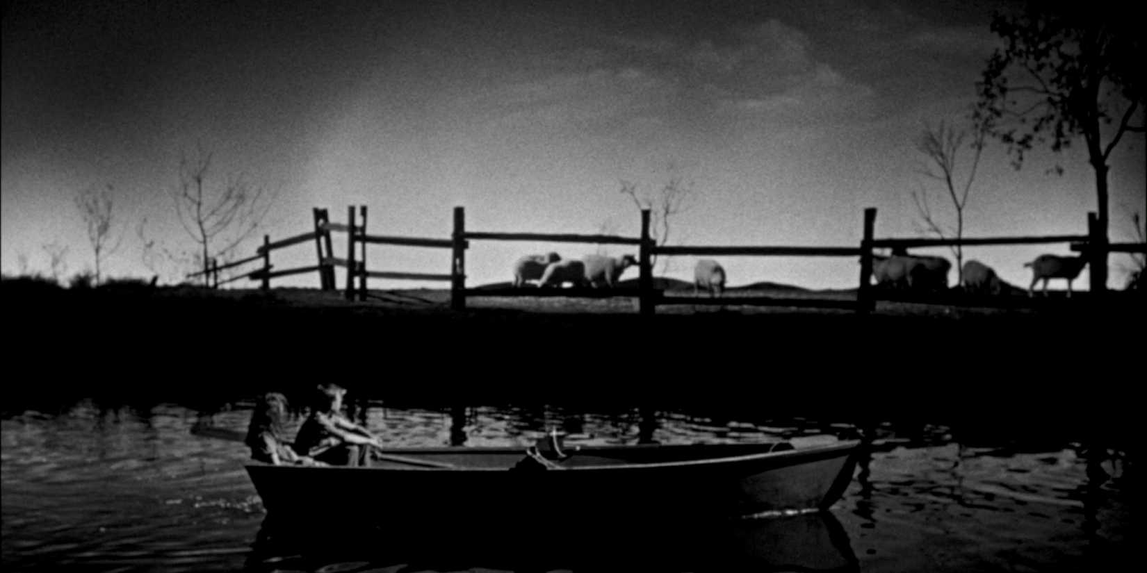 Two children in a canoe in The Night of the Hunter