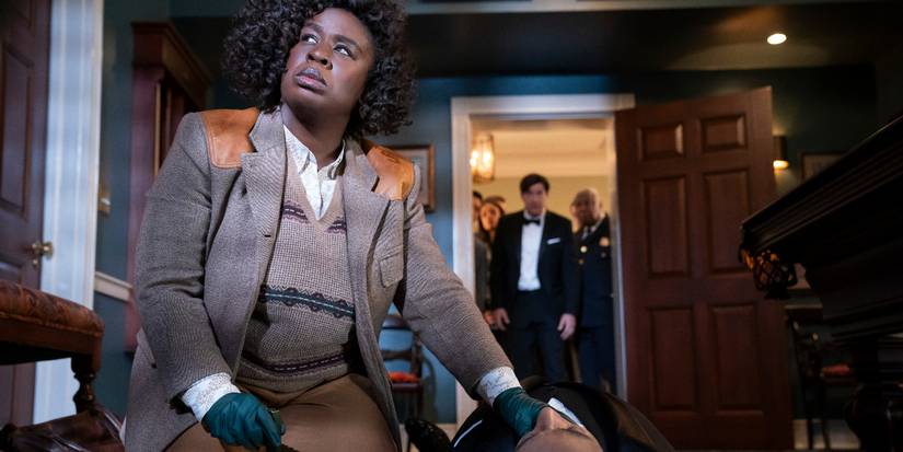 Uzo Aduba investigates a murder victim's body, played by Giancarlo Esposito, in The Residence.