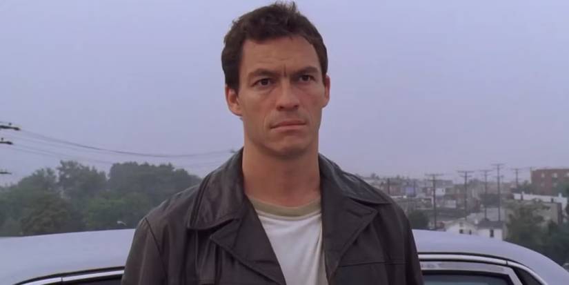 Dominic West as Jimmy McNulty staring blankly ahead in the finale of 'The Wire'.