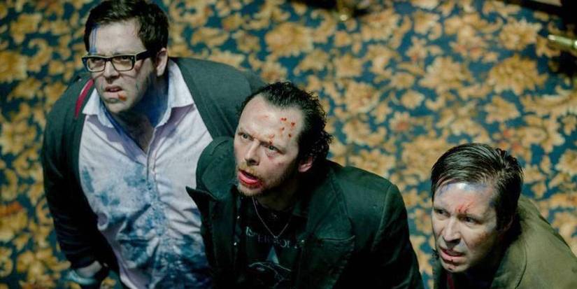 Nick Frost, Simon Pegg, and Paddy Considine looking up in 'The World's End'.