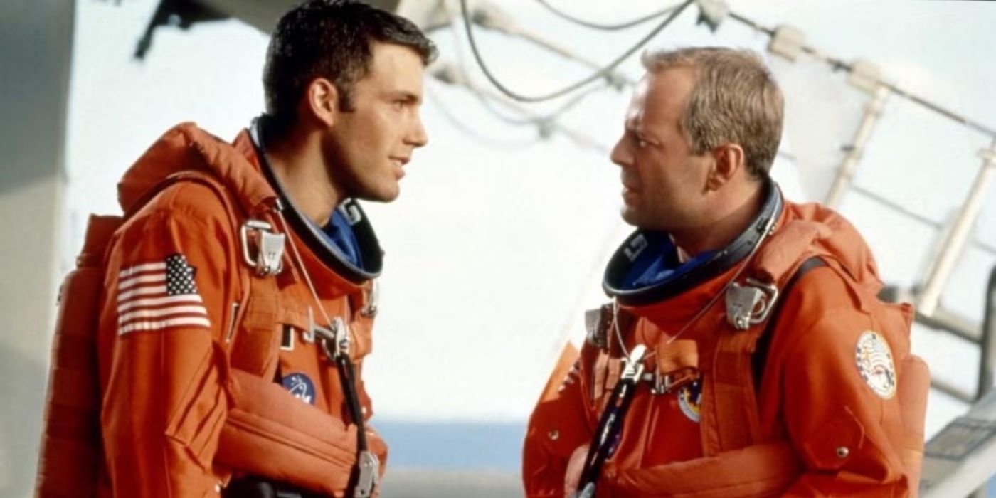 Ben Affleck and Bruce Willis as AJ and Harry, looking at each other in 'Armageddon'.
