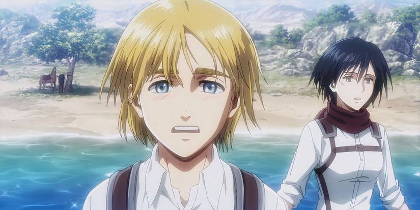 Armin feeling emotional with Mikasa at the ocean in Attack on Titan.