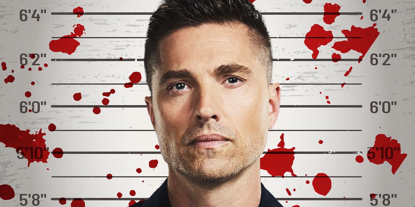 Eric Winter in front of a mugshot line-up chart with blood splattered on it