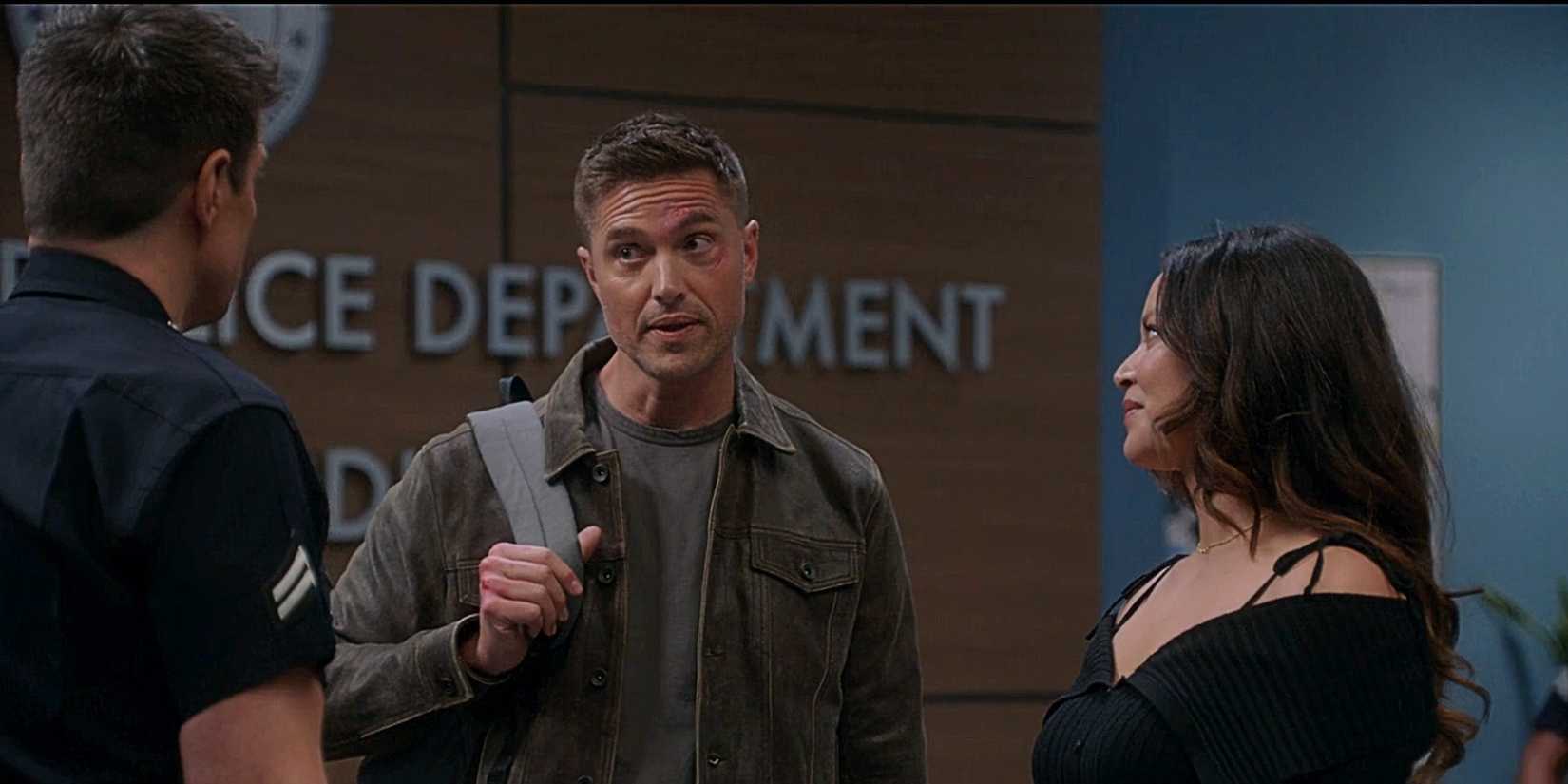 Tim Bradford and Lucy Chen standing together in The Rookie Season 7