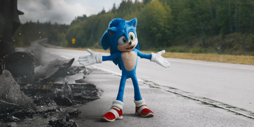 Sonic stands with his arms open on the road in Sonic the Hedgehog.