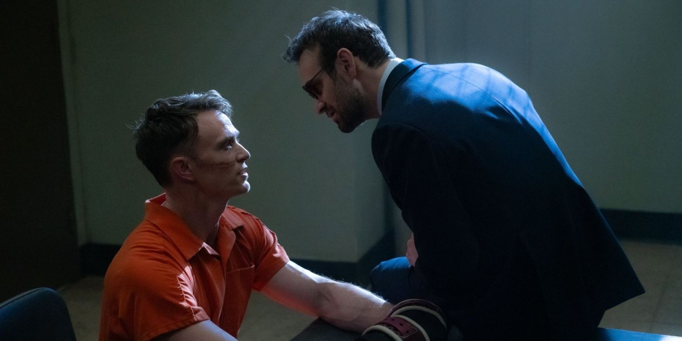 Matt Murdock (Charlie Cox) sitting on a table while Ben Poindexter/Bullseye (Wilson Bethel) is handcuffed to the table in Daredevil: Born Again.