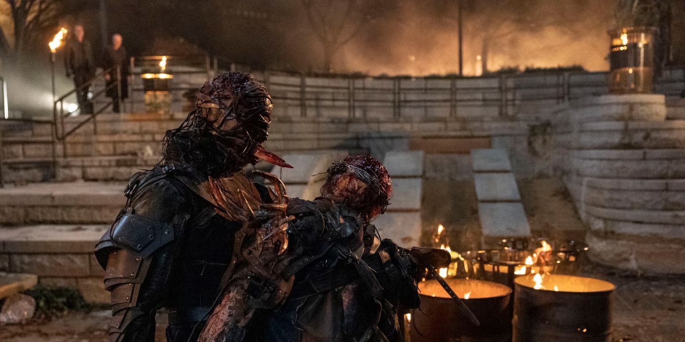 two walkers fight over a burning trash can