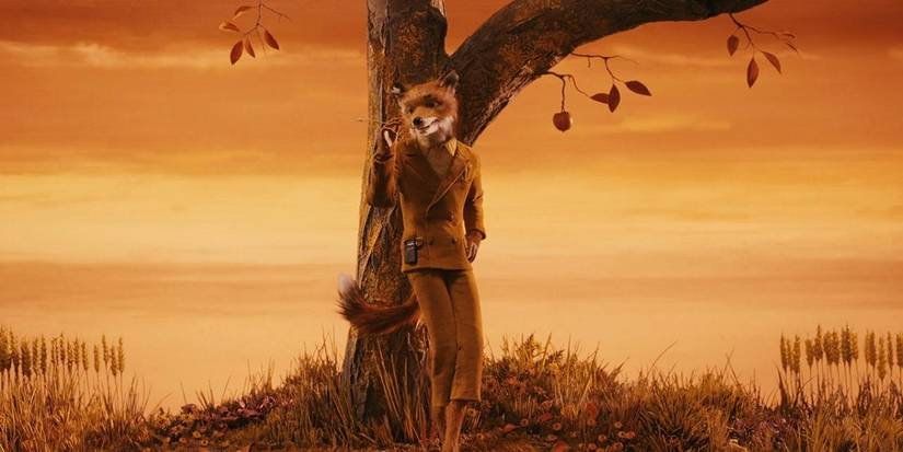 Fantastic Mr. Fox standing under a tree with an orange backdrop