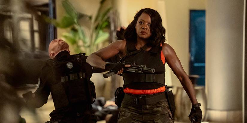 Viola Davis as Danielle Sutton with a cop falling behind her in G20