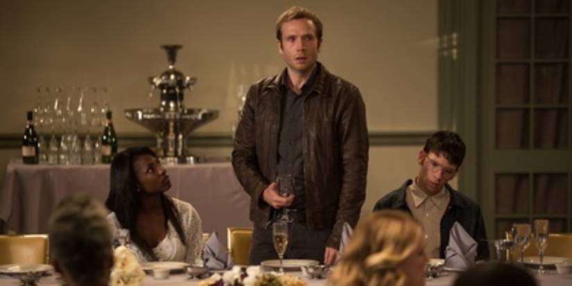 Elliot, played by Mark Webber, gives a speech at a dinner in 13 Sins