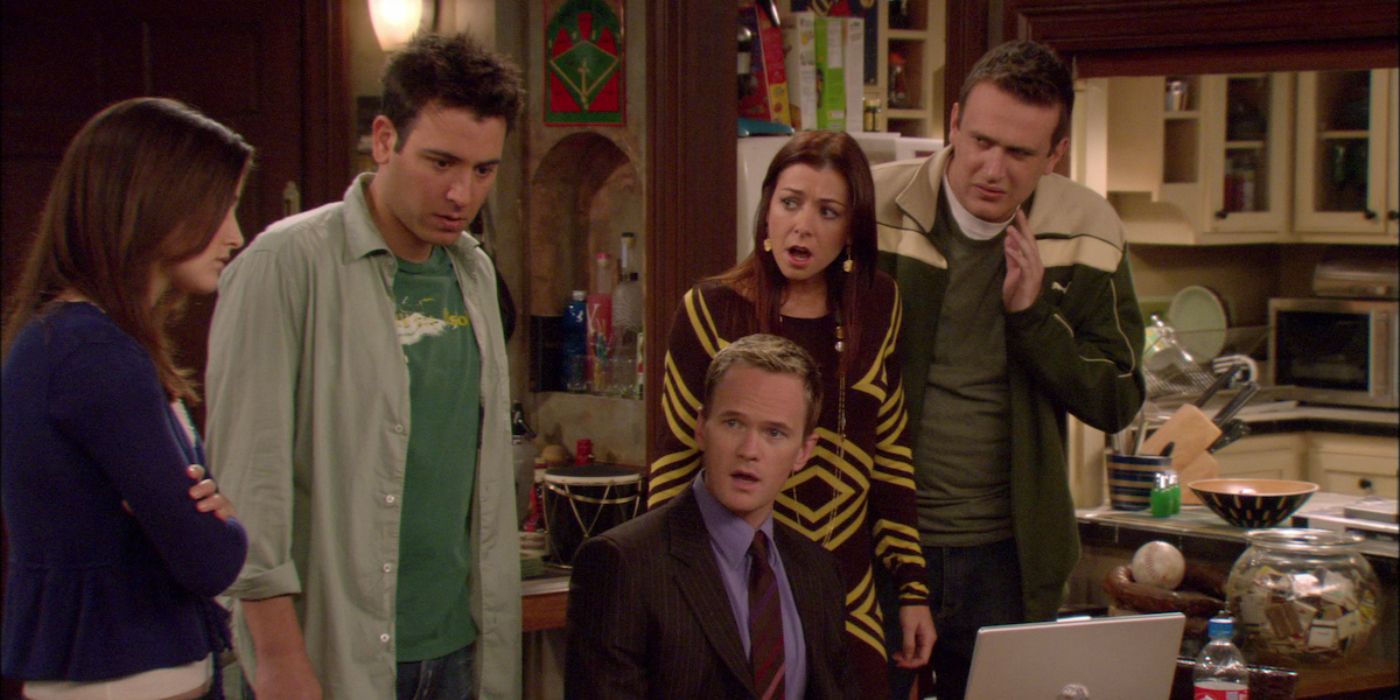 The cast of How I Met Your Mother shocked as Barney sits in front of an open laptop