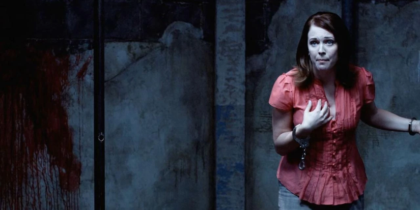 Melissa Joan Hart chained to a pole in Nine Dead