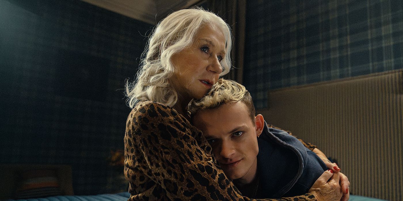 Helen Mirren holding Anson Boon on a bed in MobLand 