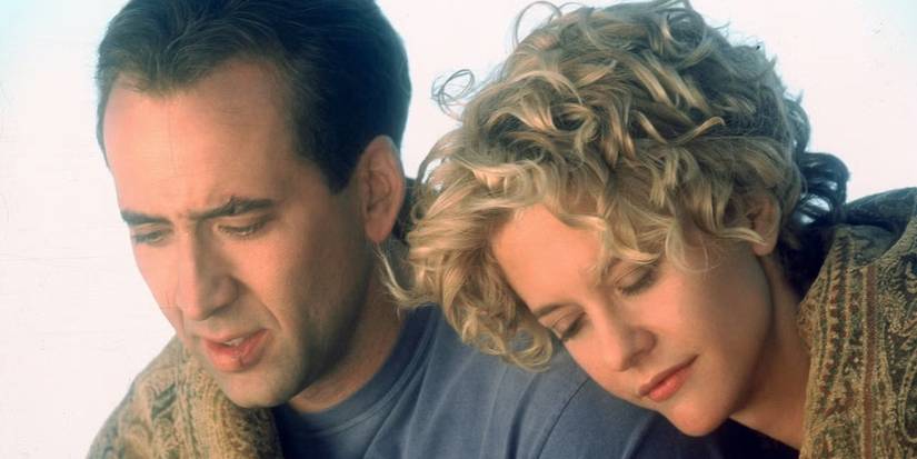 Meg Ryan leans against Nicolas Cage's shoulder in City of Angels.