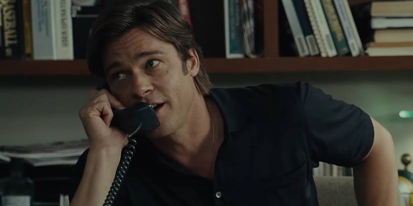 Brad Pitt on the phone in Moneyball.