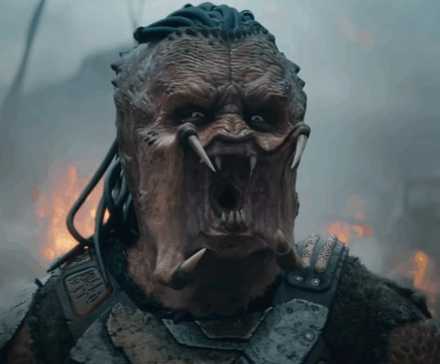 The Predator with its mouth open wide in 'Predator: Badlands'